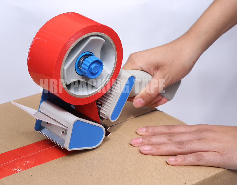 Shipping tape dispenser